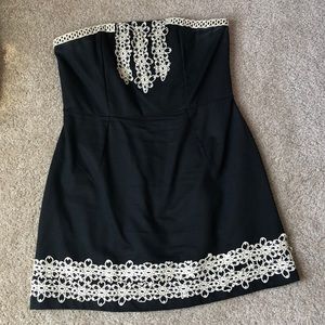 Women’s strapless black and gold dress